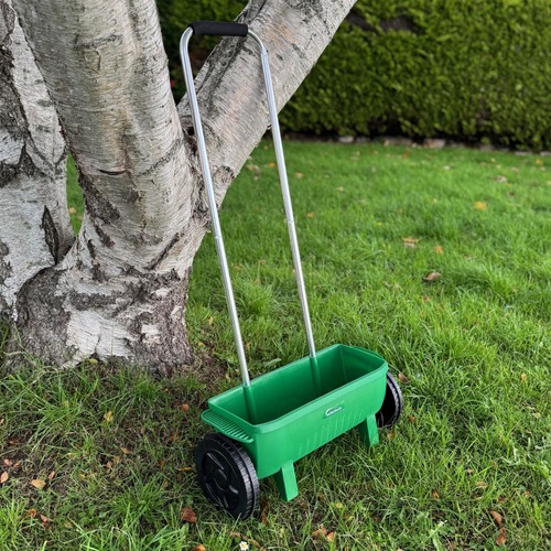 Lawn seed spreader feed and - lawn,